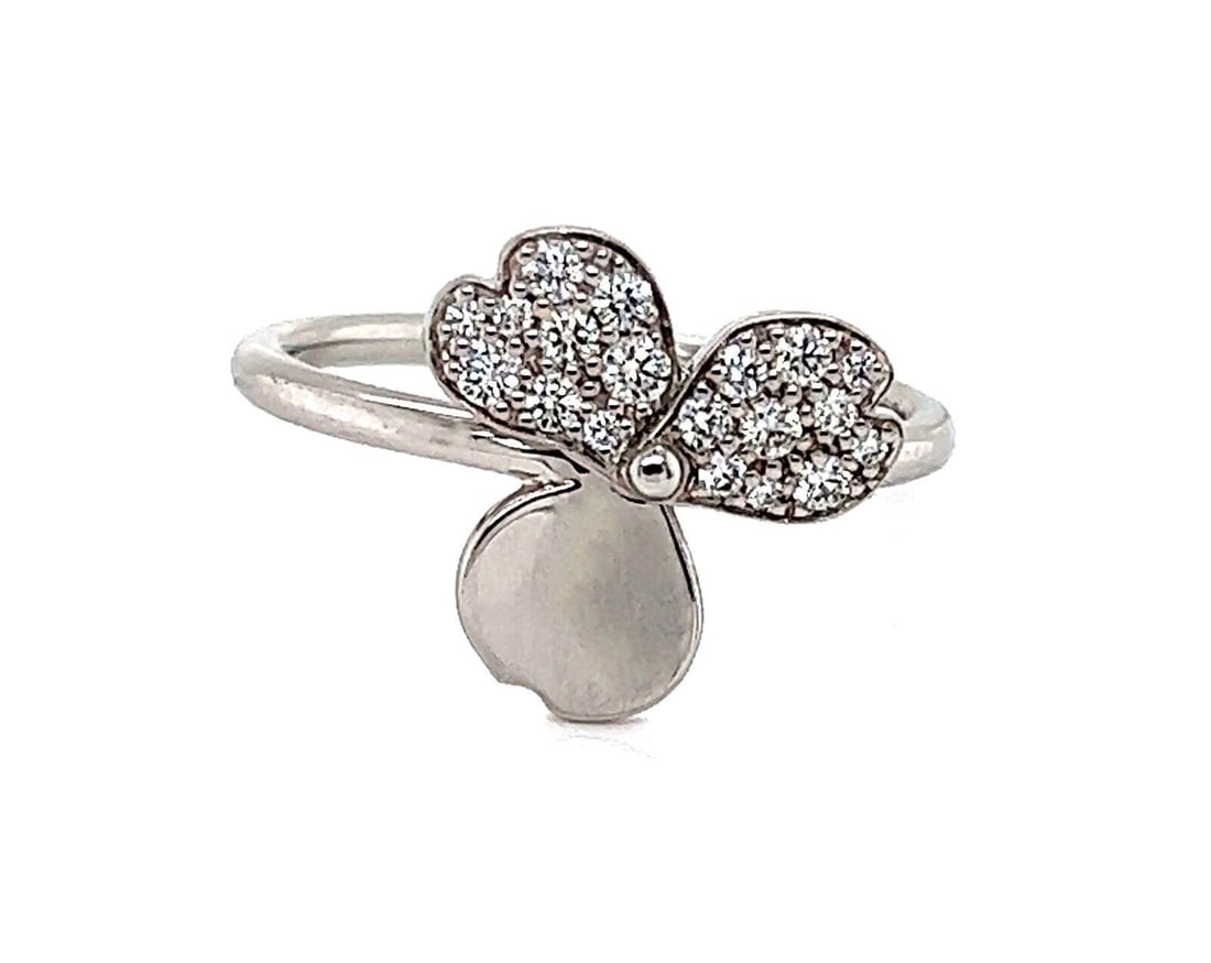 Diamond Platinum Flower Ring from Tiffany Paper Flowers Collection Size 6: Diamond Platinum Flower Ring from Tiffany Paper Flowers Collection Size 6 This Tiffany & Co. Paper Flower Diamond Ring is crafted in platinum and features a floral design set with a sparkling diamond
