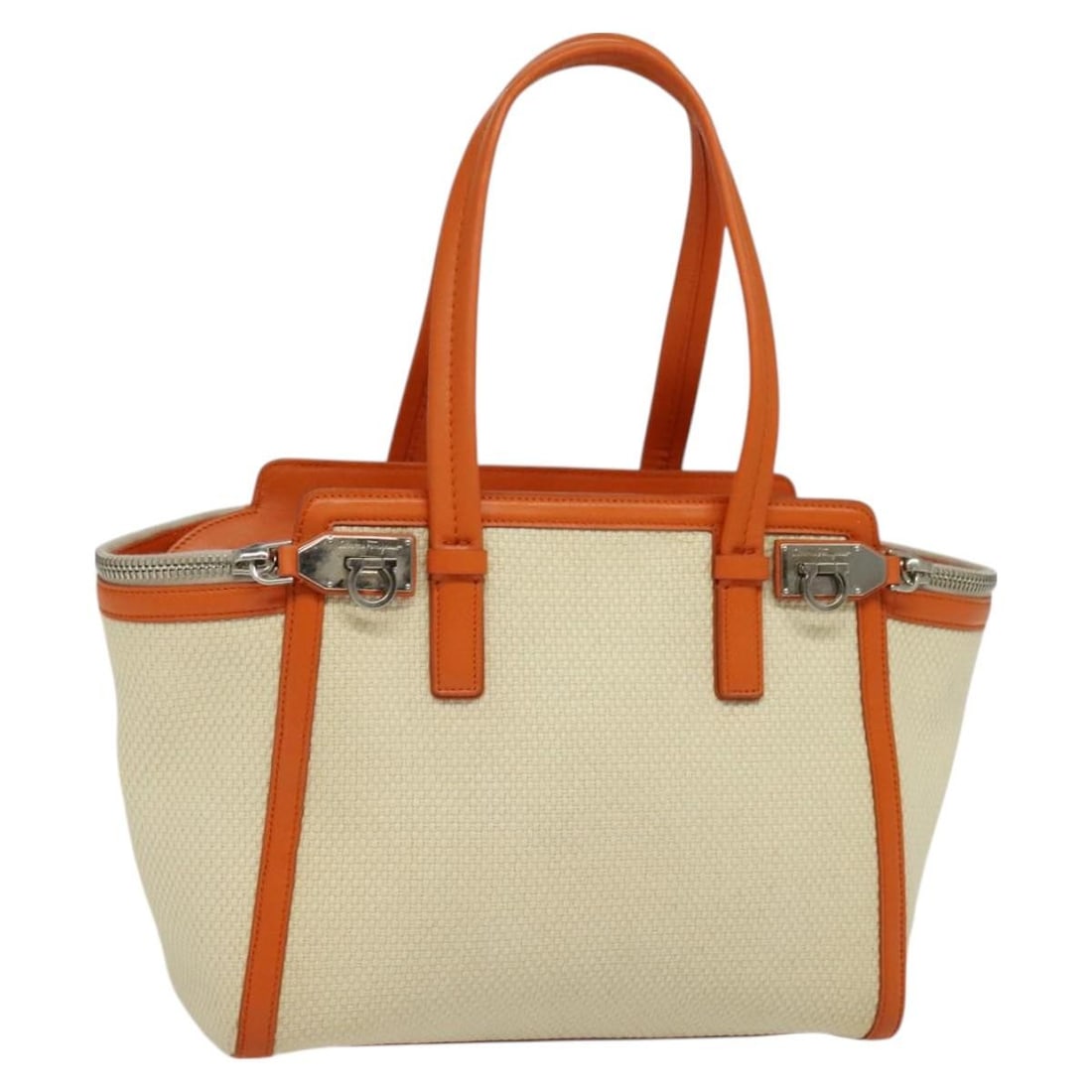 Gancini Beige Canvas Leather Tote by Salvatore Ferragamo: Gancini Beige Canvas Leather Tote by Salvatore Ferragamo This Salvatore Ferragamo Gancini Tote is crafted from beige canvas with leather accents. Designed for women, it features a spacious interior wi