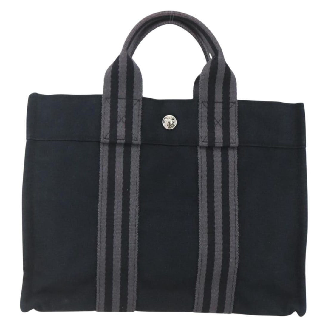 Hermes Black Canvas Fourre Tout Tote Bag 30cm x 22cm x 9cm: Hermes Black Canvas Fourre Tout Tote Bag 30cm x 22cm x 9cm This Hermes Fourre Tout Tote is crafted from black canvas and designed for women. It features a spacious interior with a pocket and metal fit