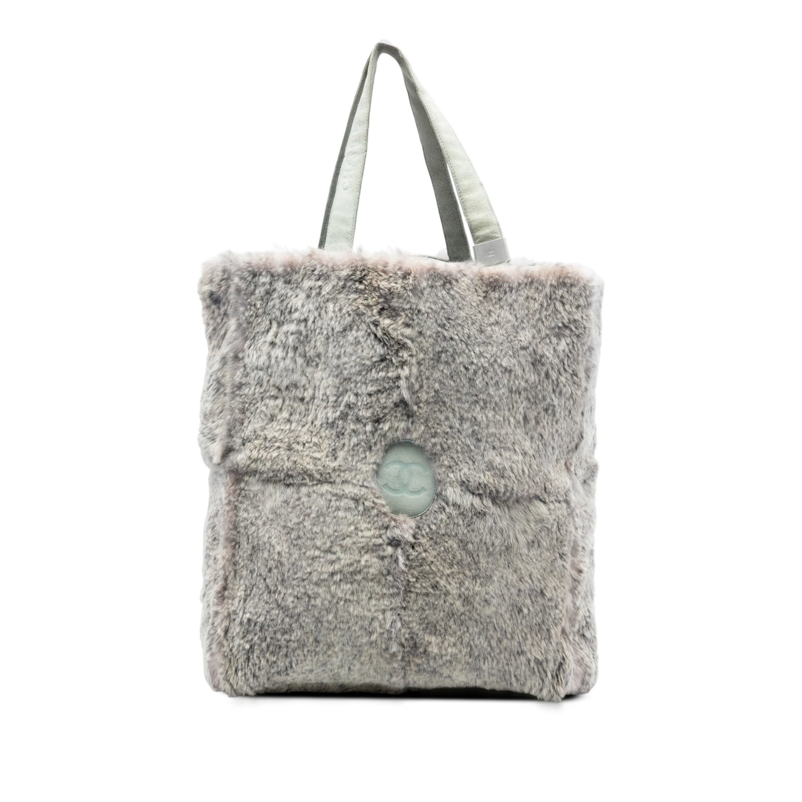 Chanel CC Gray Rabbit Fur Tote Bag with Suede Handles: Chanel CC Gray Rabbit Fur Tote Bag with Suede Handles This Chanel CC Lapin Fur Tote features a soft rabbit fur exterior complemented by flat suede leather handles. The bag has an open top design for e