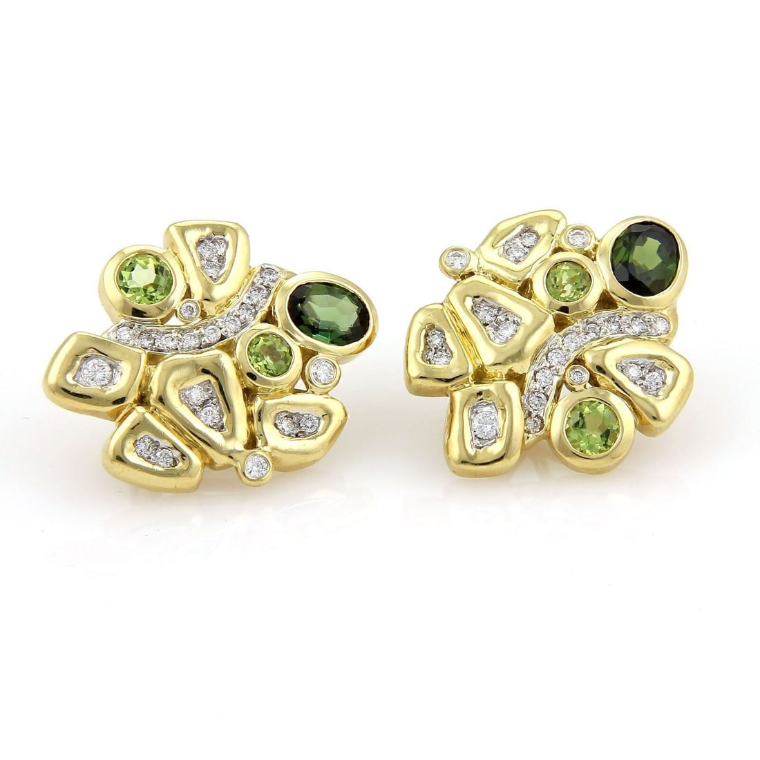 Pair of 18k Yellow Gold Huggie Earrings with Diamonds Tourmaline and Peridot: Pair of 18k Yellow Gold Huggie Earrings with Diamonds Tourmaline and Peridot These vintage huggie earrings by SeidenGang feature green tourmaline and peridot stones accented by approximately 0.30ct of
