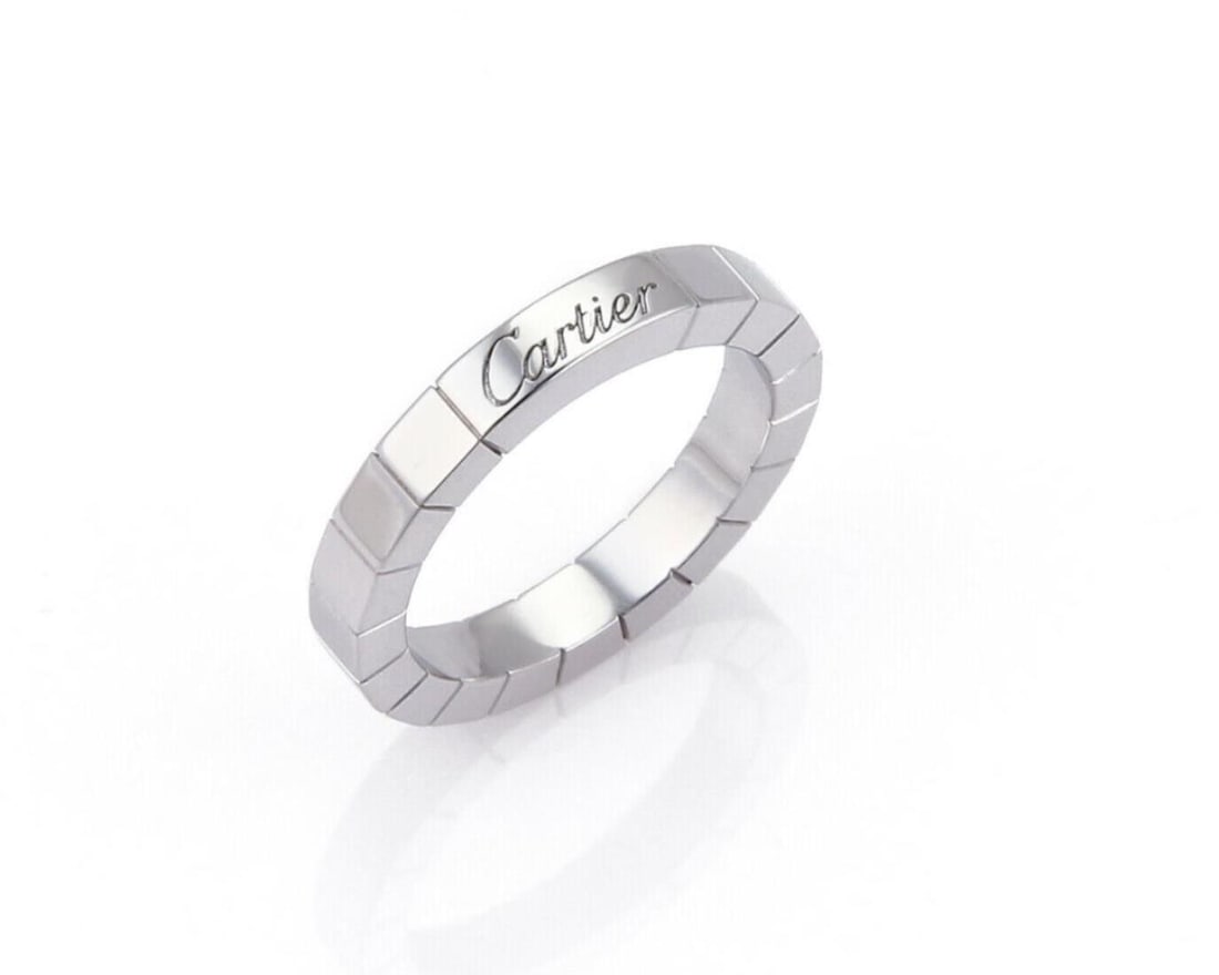 Cartier Lanieres 18k White Gold Band Ring Size 5: Cartier Lanieres 18k White Gold Band Ring Size 5 This Cartier Lanieres band ring is crafted in 18k white gold and showcases the brand's signature elegance and refined design. The band features a sleek