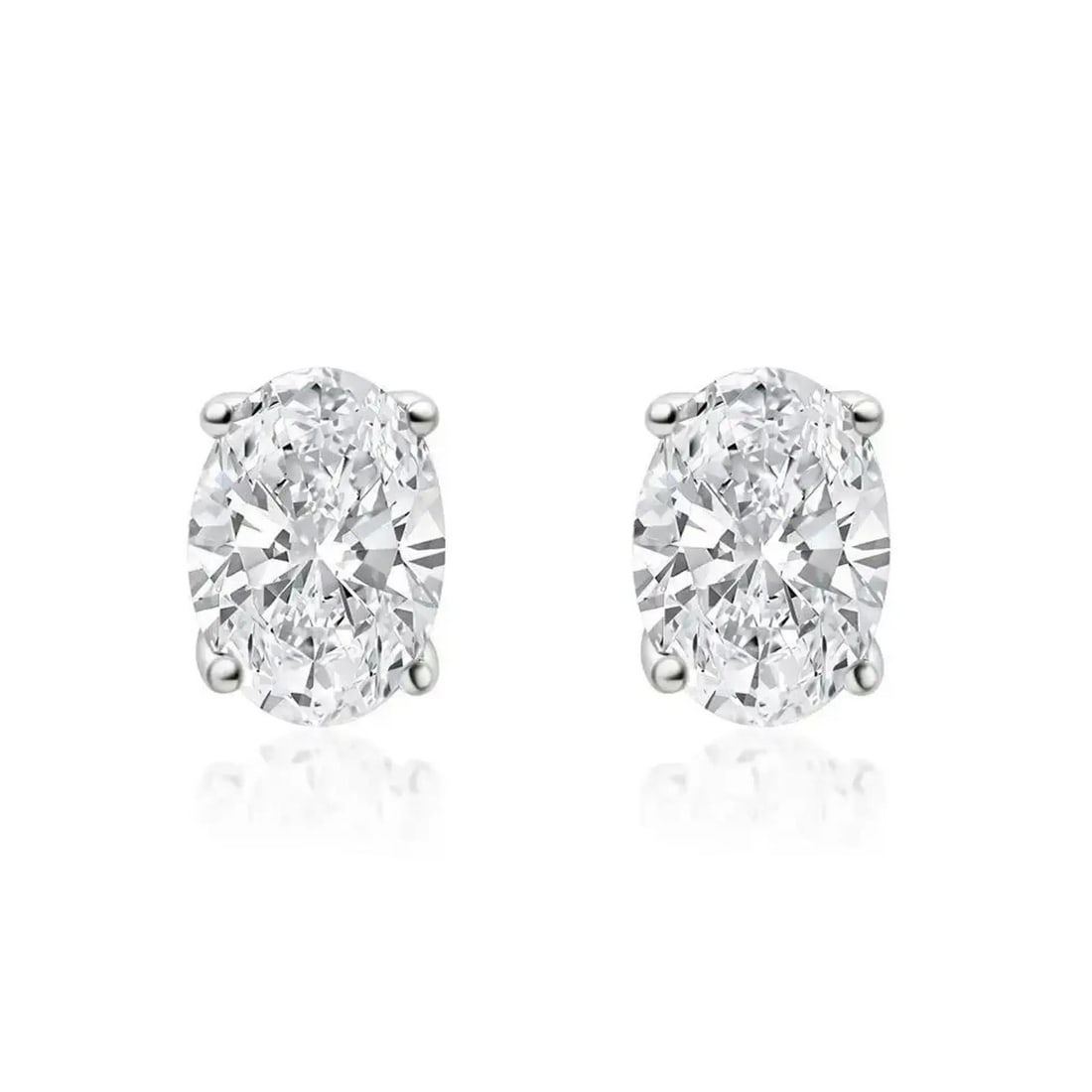 1.04 Carat Oval Lab Diamond Stud Earrings in 14K Yellow Gold Four Prong Setting: 1.04 Carat Oval Lab Diamond Stud Earrings in 14K Yellow Gold Four Prong Setting These stud earrings feature a pair of oval brilliant cut lab-grown diamonds with a total carat weight of 1.04 ctw, each