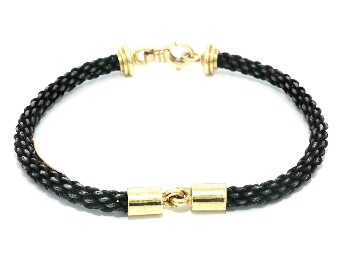 Pat Flynn 18k Yellow Gold & Iron Woven Bracelet Lobster Claw Clasp: Pat Flynn 18k Yellow Gold & Iron Woven Bracelet Lobster Claw Clasp This exquisite bracelet is a perfect blend of iron and 18k yellow gold, showcasing a woven design that adds elegance to any outfit. T