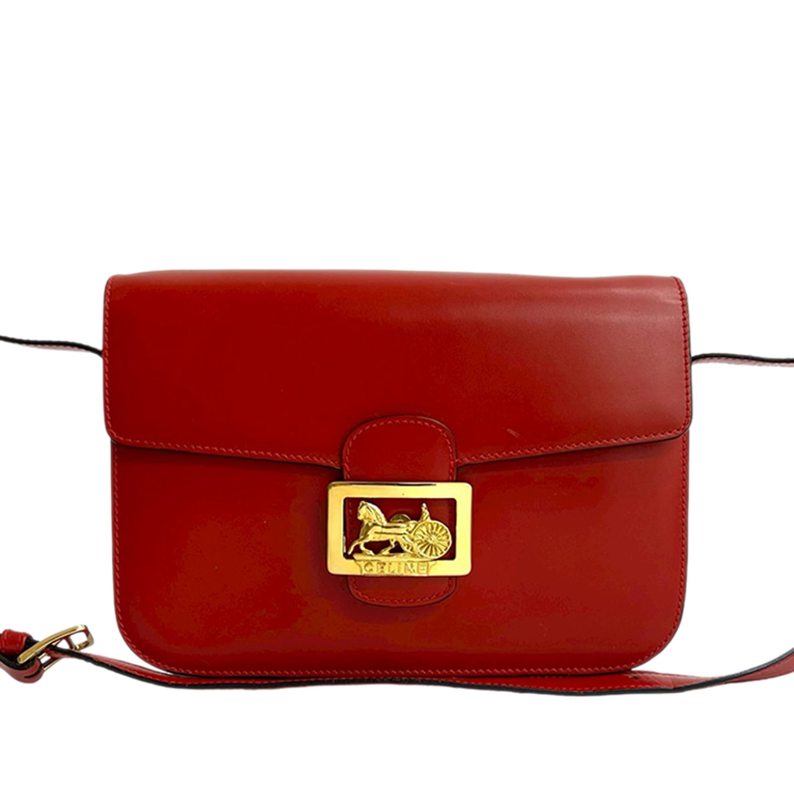 Celine Horse Carriage Red Leather Crossbody Bag: Celine Horse Carriage Red Leather Crossbody Bag This Celine Calfskin Horse Carriage Crossbody bag features a red leather body, a flat leather strap, a front flap with a magnetic closure, and interior