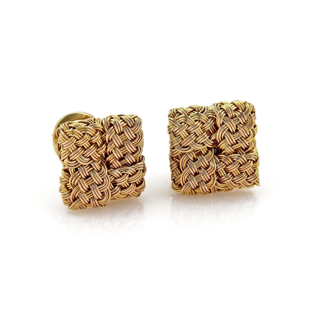 18k Yellow Gold Huggie Earrings by John Hardy Basket Weave Square Design: 18k Yellow Gold Huggie Earrings by John Hardy Basket Weave Square Design These John Hardy earrings feature a huggie style with a square post clip design. Crafted in 18k yellow gold, they showcase a di