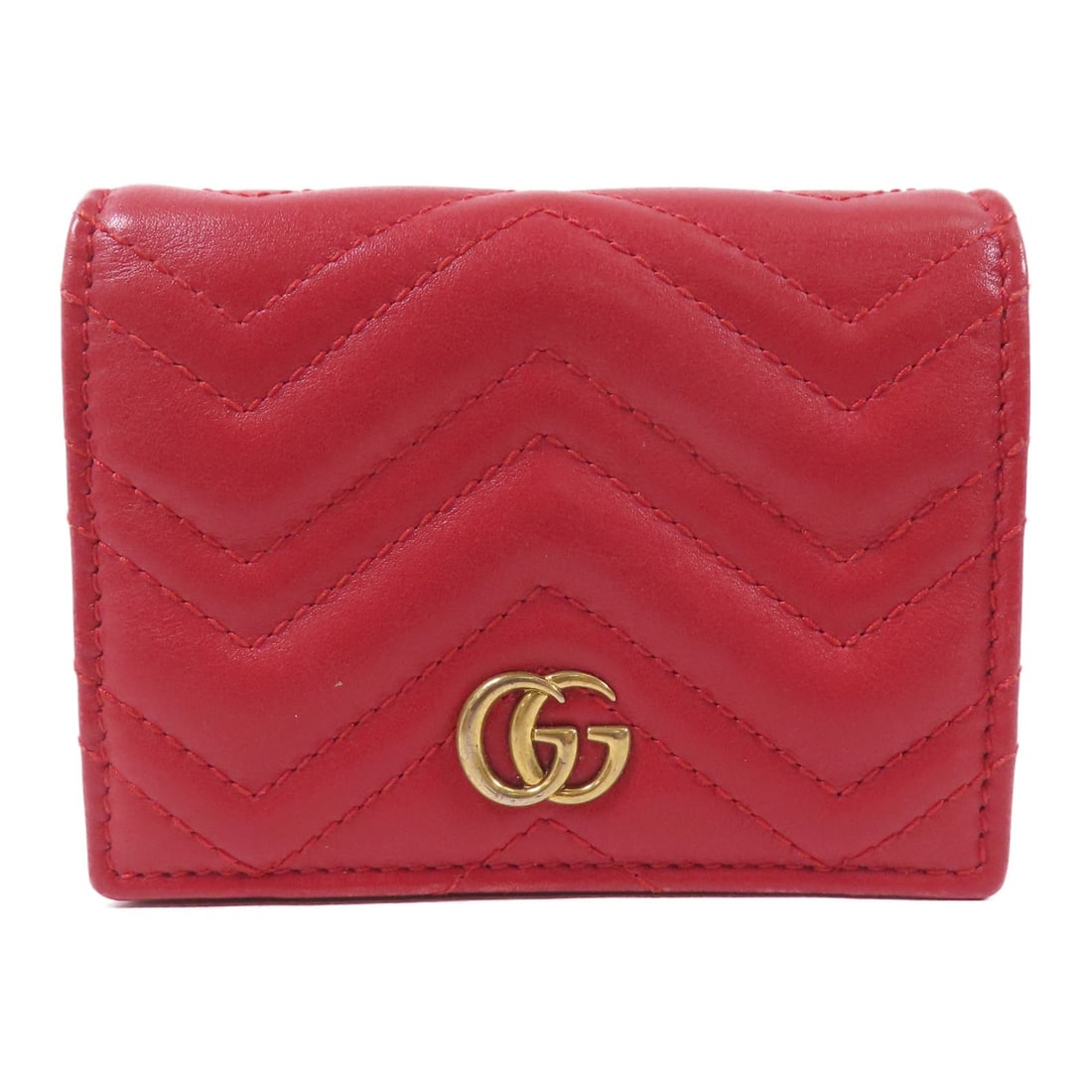 Gucci GG Marmont Red Calfskin Bifold Wallet with Gold Hardware: Gucci GG Marmont Red Calfskin Bifold Wallet with Gold Hardware This is a Gucci GG Marmont short bi-fold wallet crafted from red calfskin leather. The wallet features GG hardware and is designed for re