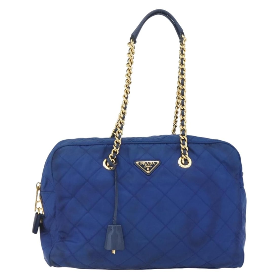 Blue Nylon Quilted Shoulder Bag by Prada with Chain Strap: Blue Nylon Quilted Shoulder Bag by Prada with Chain Strap This Prada Chain Shoulder Bag for women features a quilted tessuto nylon exterior in blue. It includes a shoulder strap with a chain detail an