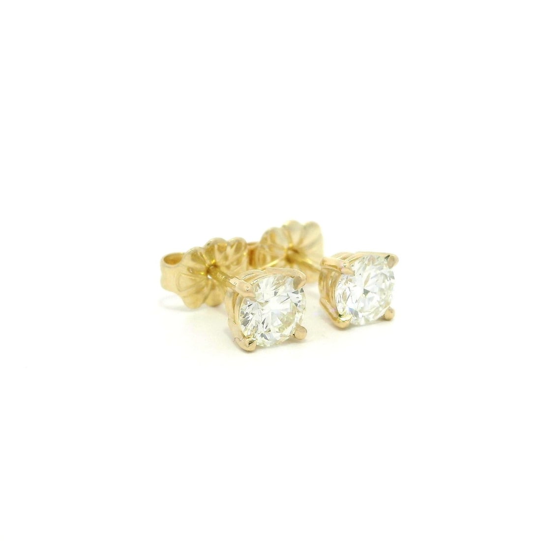 NEW Classic 14k Yellow Gold 0.75ctw Diamond Stud Earrings: NEW Classic 14k Yellow Gold 0.75ctw Diamond Stud Earrings Elevate your elegance with these classic stud earrings, crafted from solid 14k yellow gold. Featuring two natural round brilliant cut diamonds