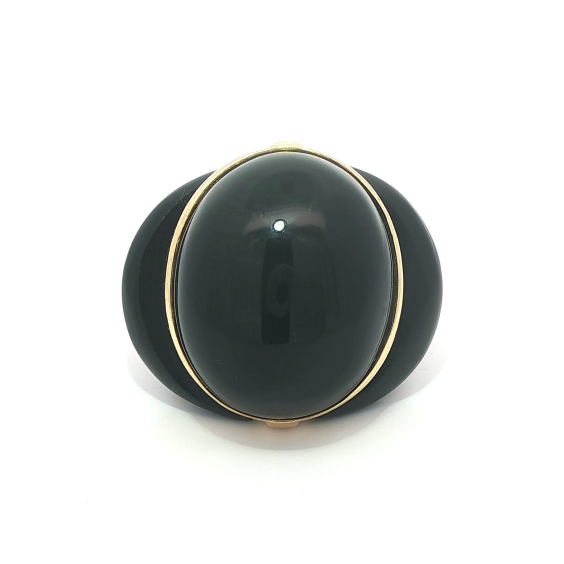 Heavy 16k Yellow Gold Cocktail Ring with Black Onyx Cabochon Stones: Heavy 16k Yellow Gold Cocktail Ring with Black Onyx Cabochon Stones This vintage cocktail ring features three natural black onyx stones in cabochon cut, including a custom oval and crescent shape, bez