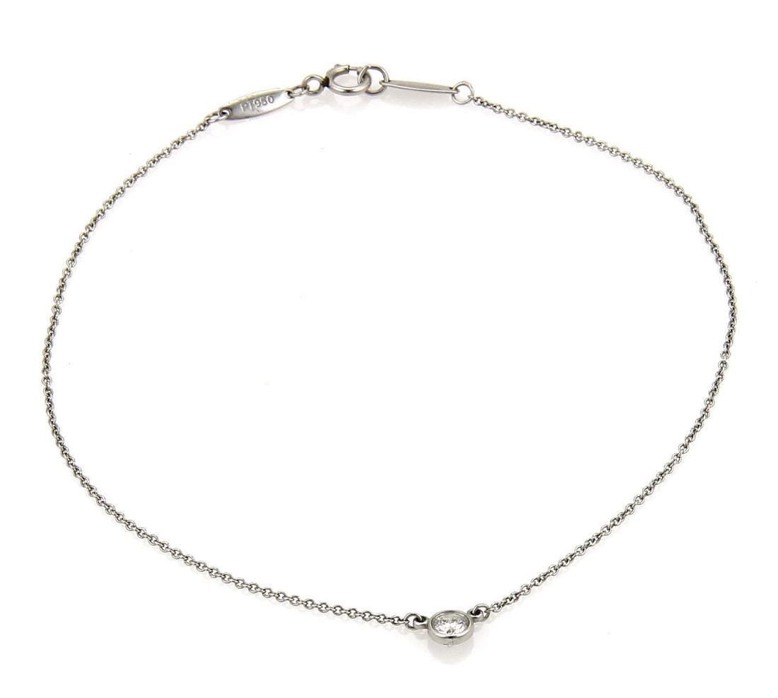 Peretti Diamond By The Yard Platinum 8.5 Inch Bracelet by Tiffany & Co.: Peretti Diamond By The Yard Platinum 8.5 Inch Bracelet by Tiffany & Co. This Tiffany & Co. Peretti Diamond By The Yard bracelet features a sleek platinum chain adorned with a 0.17ct diamond. Measuring