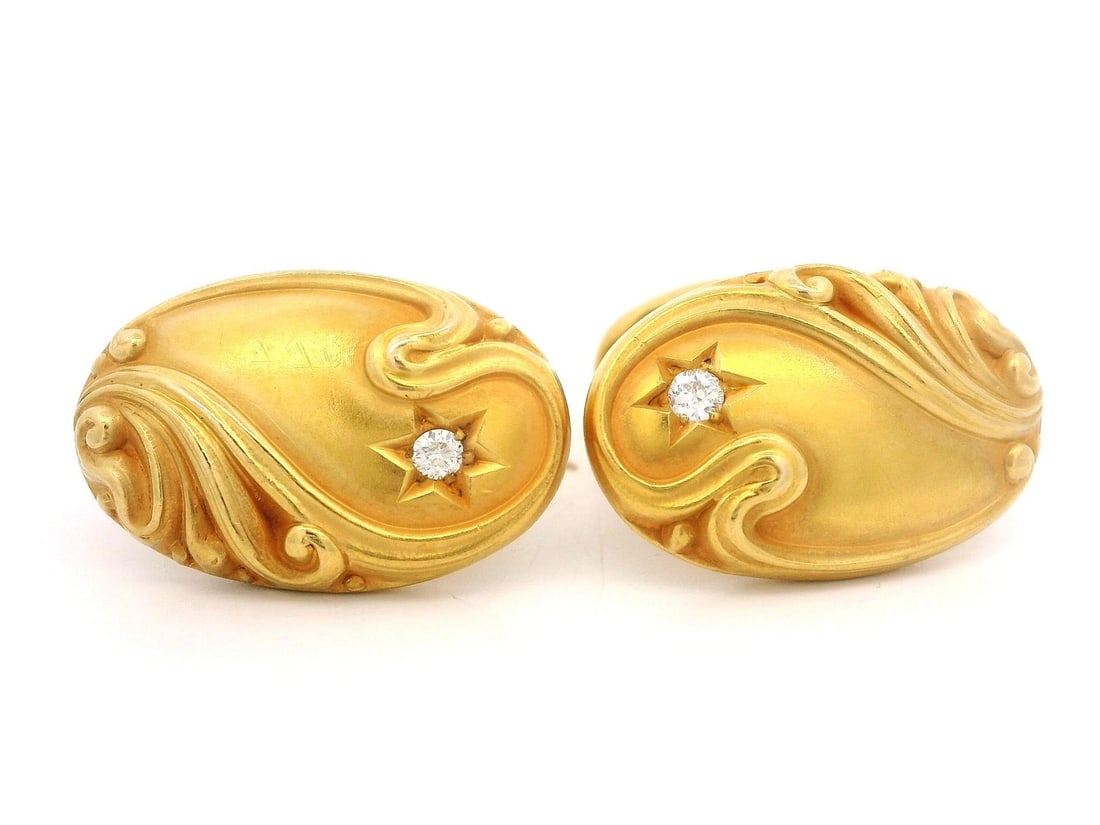 Antique Art Nouveau 14k Gold Diamond Cufflinks Oval Repousse Design: Antique Art Nouveau 14k Gold Diamond Cufflinks Oval Repousse Design Discover these exquisite Antique Art Nouveau cufflinks, skillfully crafted in solid 14k yellow gold and featuring two natural genuin