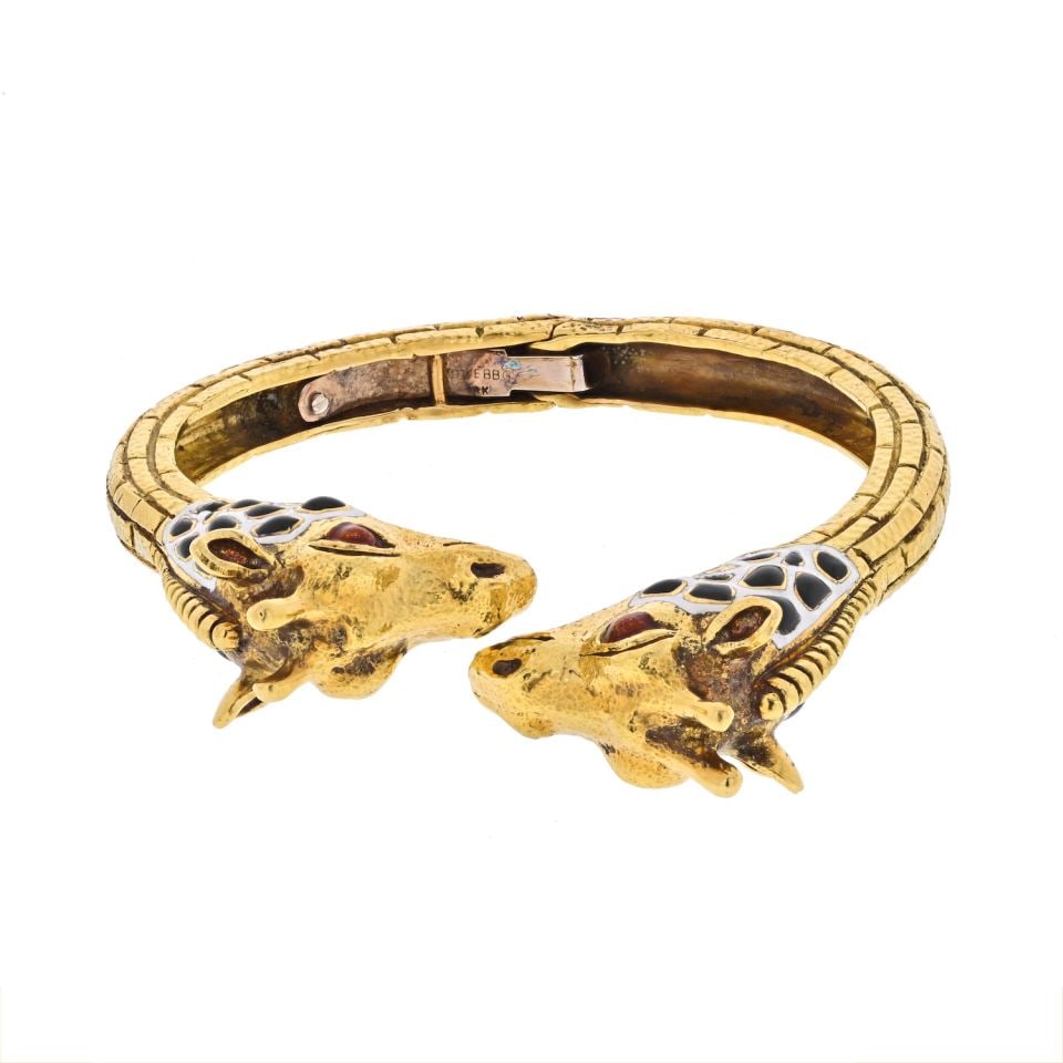 1960s WEBB 18K Yellow Gold Gemstone Bangle Bracelet: 1960s WEBB 18K Yellow Gold Gemstone Bangle Bracelet This exquisite bangle bracelet is meticulously crafted from 18K yellow gold and showcases an impressive array of gemstones, including 6 carats of di