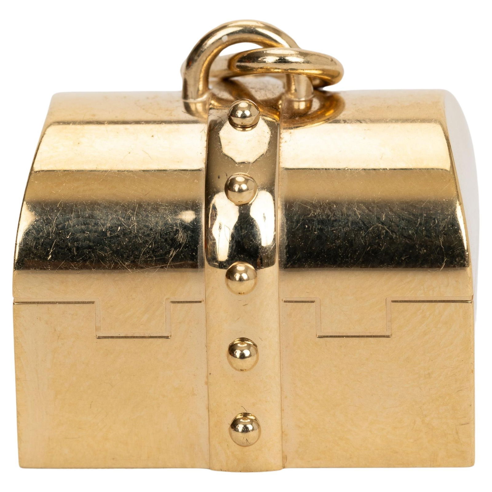 Hermes Gold Curiosity Box Charm Mixed Metal with Box: Hermes Gold Curiosity Box Charm Mixed Metal with Box This exquisite Hermes Gold Curiosity Box Charm is crafted from mixed metal and showcases a unique design reminiscent of a treasure trunk. Measuring