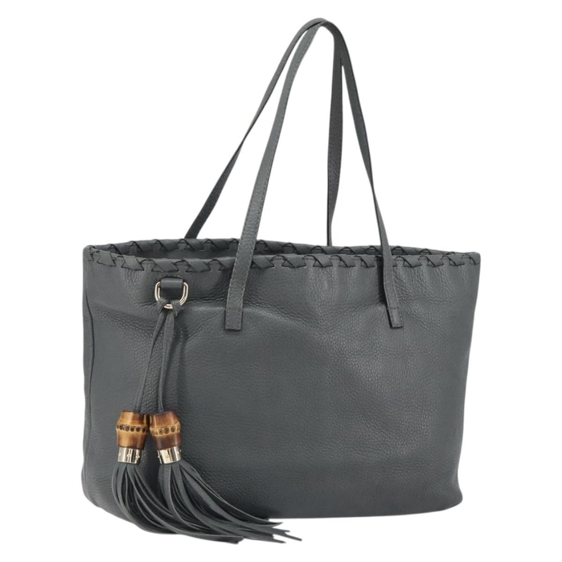 Gray Leather Gucci Bamboo Tassel Tote Bag with Italian Origin: Gray Leather Gucci Bamboo Tassel Tote Bag with Italian Origin This Gucci Bamboo Tassel Tote is crafted from gray leather and features signature bamboo tassels. Designed for women, it offers ample spac
