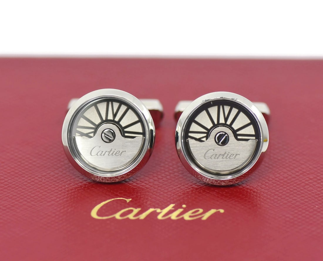 Cartier Oscillating Weight Cufflinks in Sterling Silver with Box: Cartier Oscillating Weight Cufflinks in Sterling Silver with Box Elevate your formal attire with these Cartier Oscillating Weight Cufflinks, crafted from luxurious sterling silver. These cufflinks fea