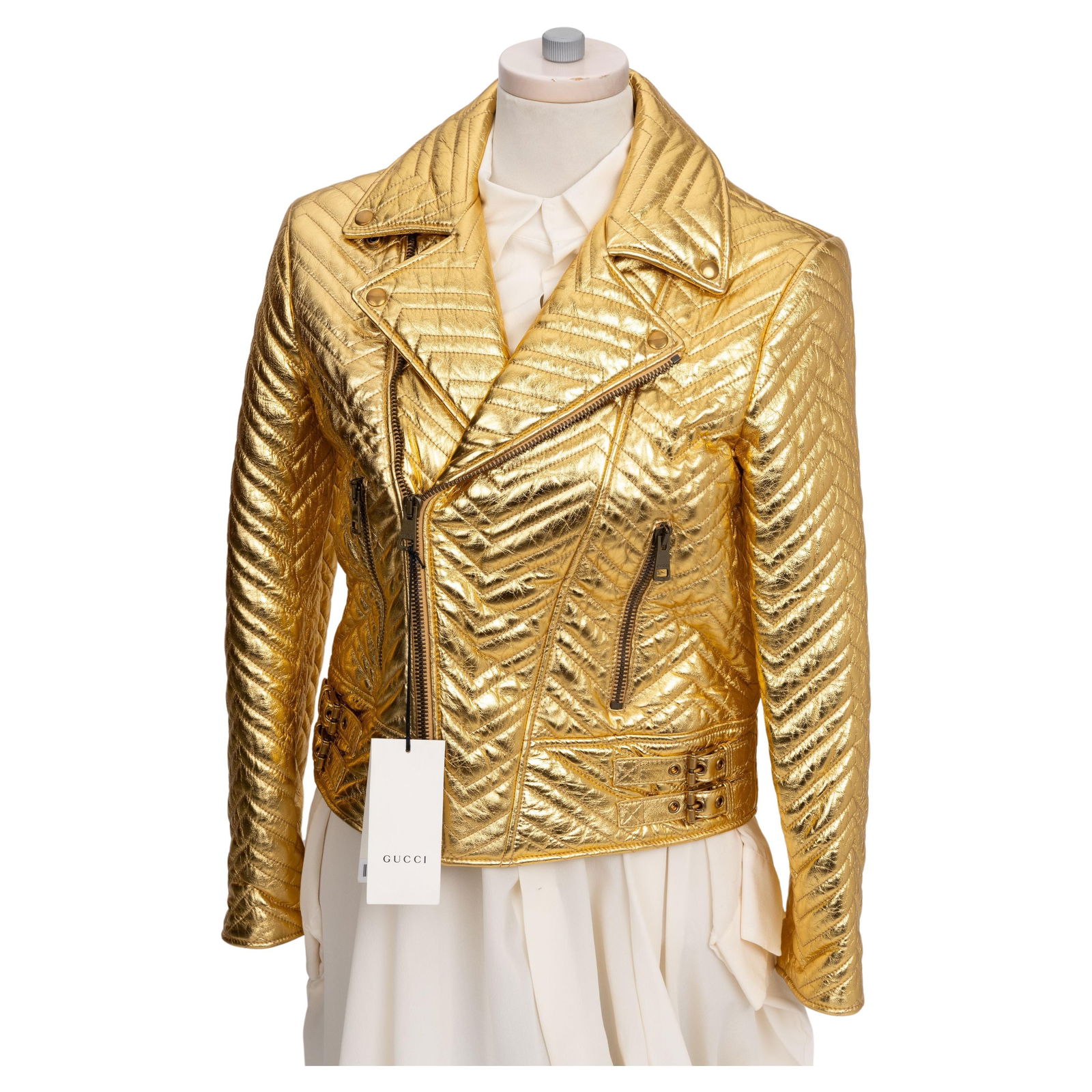 Gucci Marmont Gold Leather Biker Jacket with Signature Heart: Gucci Marmont Gold Leather Biker Jacket with Signature Heart Introducing the Gucci New Marmont Gold Biker Jacket, a stunning blend of style and luxury. This biker jacket is crafted from soft leather i