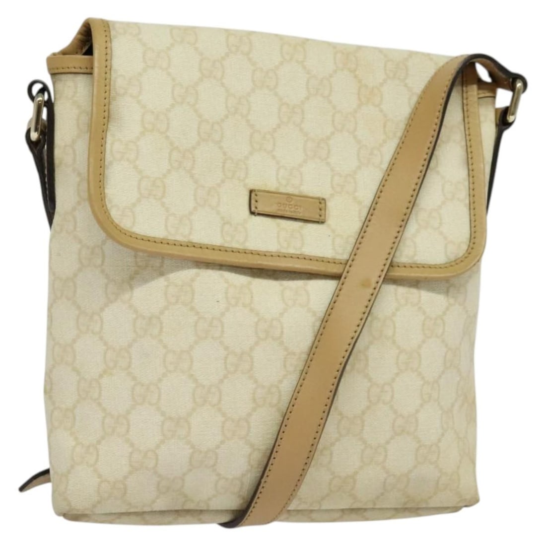 Gucci GG Coated Canvas Unisex Flap Messenger Bag 23cm by 24cm by 3cm: Gucci GG Coated Canvas Unisex Flap Messenger Bag 23cm by 24cm by 3cm This Gucci Flap Messenger bag features a beige GG coated canvas exterior with a PVC material construction. Designed as a unisex mod