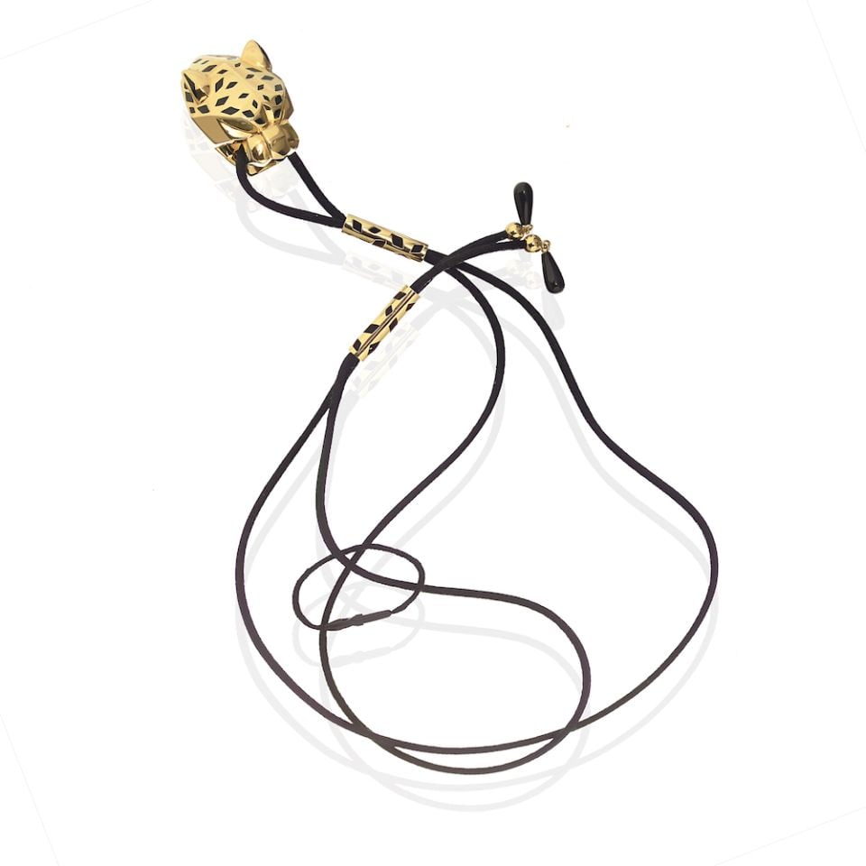 Cartier Panthere 18K Yellow Gold Pendant with Onyx and Peridot: Cartier Panthere 18K Yellow Gold Pendant with Onyx and Peridot This exquisite Cartier Panthere pendant is crafted from luxurious 18K yellow gold, weighing 46.7 grams, and features a striking design th