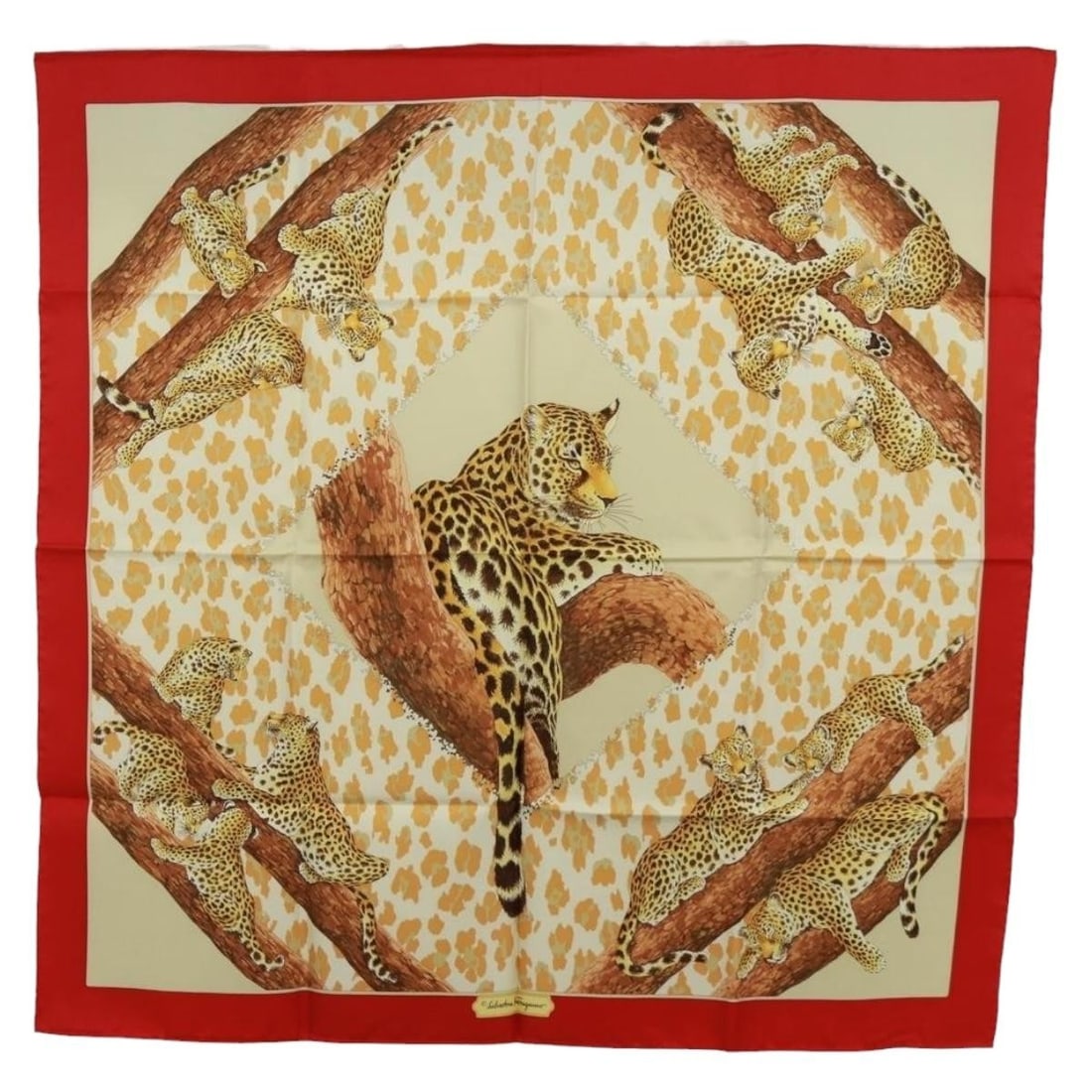 Red Silk Scarf by Salvatore Ferragamo 35.4 Inch Square: Red Silk Scarf by Salvatore Ferragamo 35.4 Inch Square This Salvatore Ferragamo scarf is crafted from luxurious silk in a vibrant red color. Made in Italy, it measures approximately 90 cm by 90 cm (35
