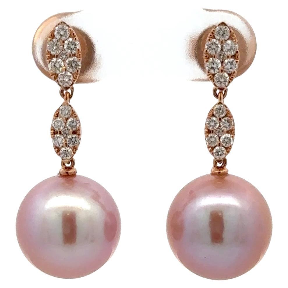 Harbor Diamonds Pink Freshwater Pearl Diamond Drop Earrings 0.45 Carats in 18KT Rose Gold: Harbor Diamonds Pink Freshwater Pearl Diamond Drop Earrings 0.45 Carats in 18KT Rose Gold Elegant and contemporary, these stunning drop earrings are crafted in 18KT rose gold. Each earring features tw