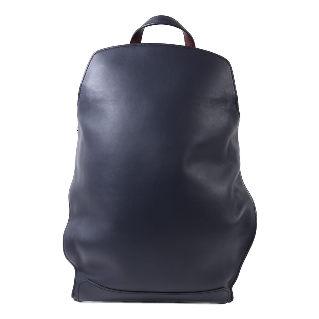 Hermes Cityback Blue and Red Calfskin Backpack with Palladium Hardware: Hermes Cityback Blue and Red Calfskin Backpack with Palladium Hardware This rucksack backpack features a sleek design crafted from high-quality blue calfskin leather with red accents. The bag offers a