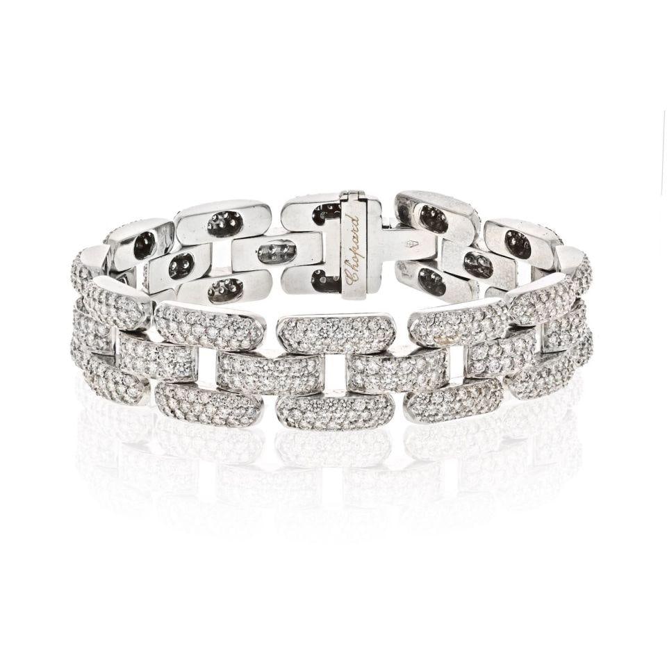 20 Carat Diamond Link Bracelet in 18K White Gold by Chopard: 20 Carat Diamond Link Bracelet in 18K White Gold by Chopard This elegant link bracelet is crafted from 18K white gold and features approximately 20 carats of round micro pave-set diamonds. The bracele