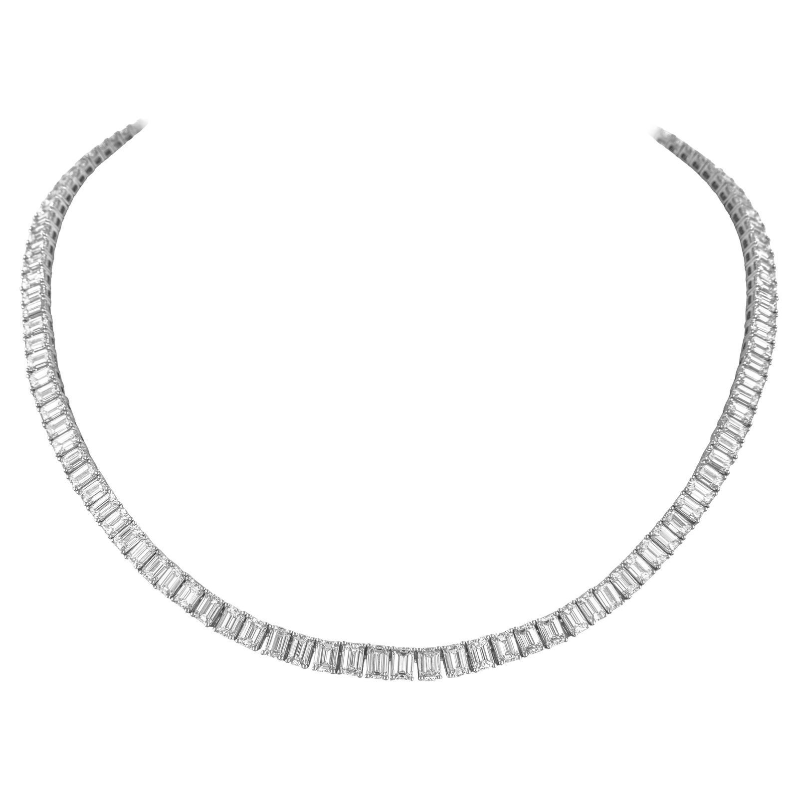 29 Carat Emerald Cut Diamond Tennis Necklace in 18k White Gold 16 Inch: 29 Carat Emerald Cut Diamond Tennis Necklace in 18k White Gold 16 Inch This elegant tennis necklace features 29 carats of natural emerald cut diamonds set in 18-karat white gold. Designed in a contemp