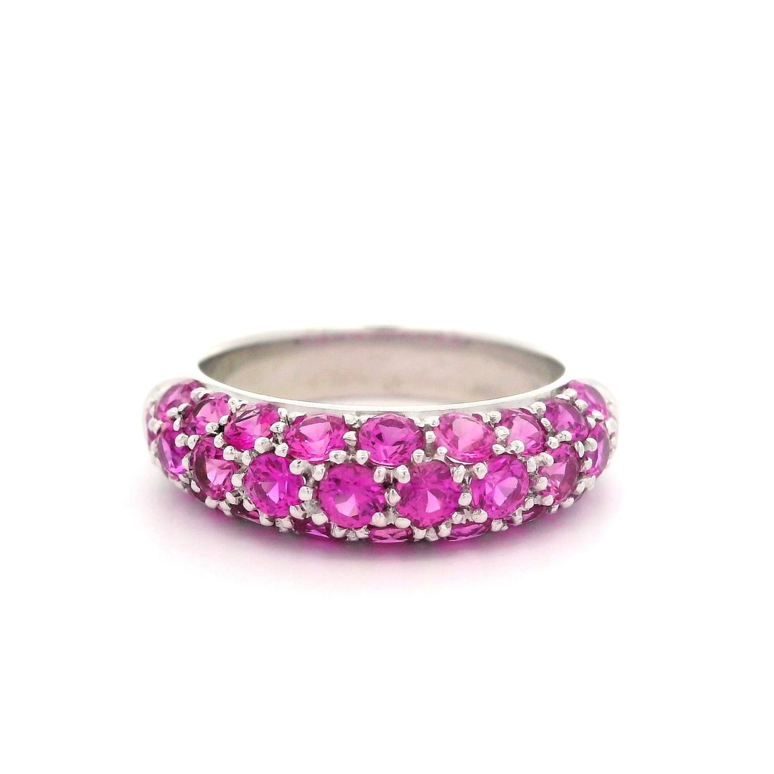 18K White Gold 2.25ct Vivid Pink Sapphire Pave Dome Ring: 18K White Gold 2.25ct Vivid Pink Sapphire Pave Dome Ring This stunning 18k White Gold ring features a captivating domed design adorned with a pave setting of 28 natural, round brilliant cut sapphires,