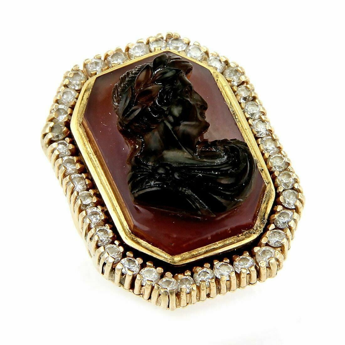 Vintage 14k Gold Ring With Diamond Carnelian Julius Caesar High Relief Carving Size 7: Vintage 14k Gold Ring With Diamond Carnelian Julius Caesar High Relief Carving Size 7 This vintage ring is crafted from 14k yellow gold and features a high relief carving of Julius Caesar. Accented wi