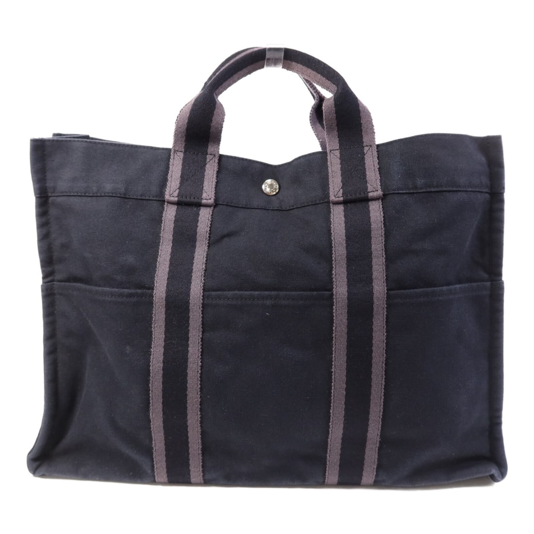 Hermes Fourre Tout MM Black Canvas Tote Bag with Silver Hardware: Hermes Fourre Tout MM Black Canvas Tote Bag with Silver Hardware This Hermes Fourre Tout Tote MM is crafted from durable black canvas and features silver-tone hardware. Designed as a versatile tote ba