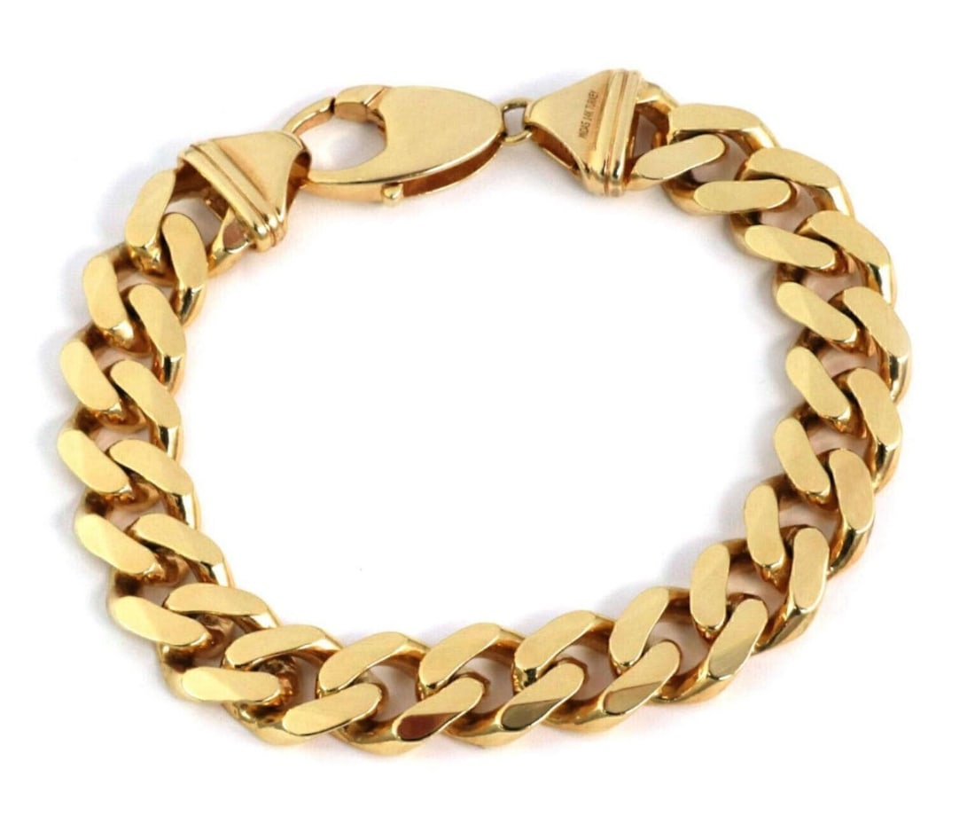 12mm Wide 14k Yellow Gold Cuban Chain Bracelet 8.5 Inch: 12mm Wide 14k Yellow Gold Cuban Chain Bracelet 8.5 Inch This Cuban link bracelet is crafted from 14k yellow gold and features a bold 12mm wide chain design. The bracelet measures 8.5 inches in length,