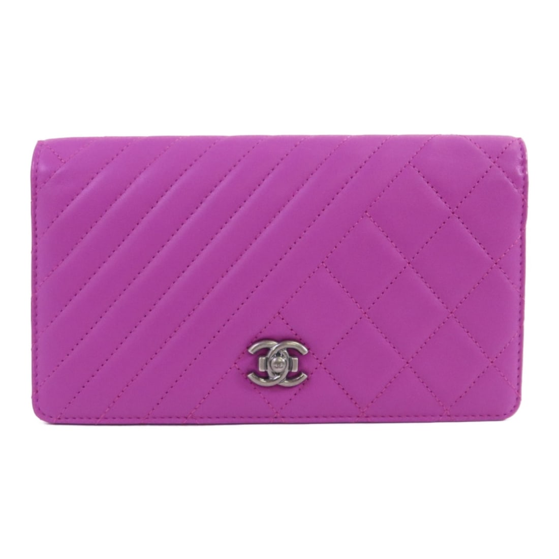 Purple Lambskin CHANEL Boy CC Bifold Long Wallet: Purple Lambskin CHANEL Boy CC Bifold Long Wallet This CHANEL CC Boy long wallet features luxurious lambskin leather in a striking purple color. Designed in a bifold style, it offers both elegance and