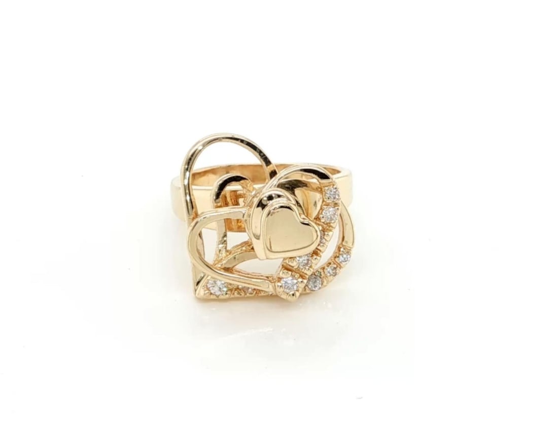 14k Yellow Gold Double Heart Diamond Spinner Ring Size 4: 14k Yellow Gold Double Heart Diamond Spinner Ring Size 4 This vintage spinner ring is crafted from solid 14k yellow gold and showcases a charming double heart design. Two open hearts, one larger and o