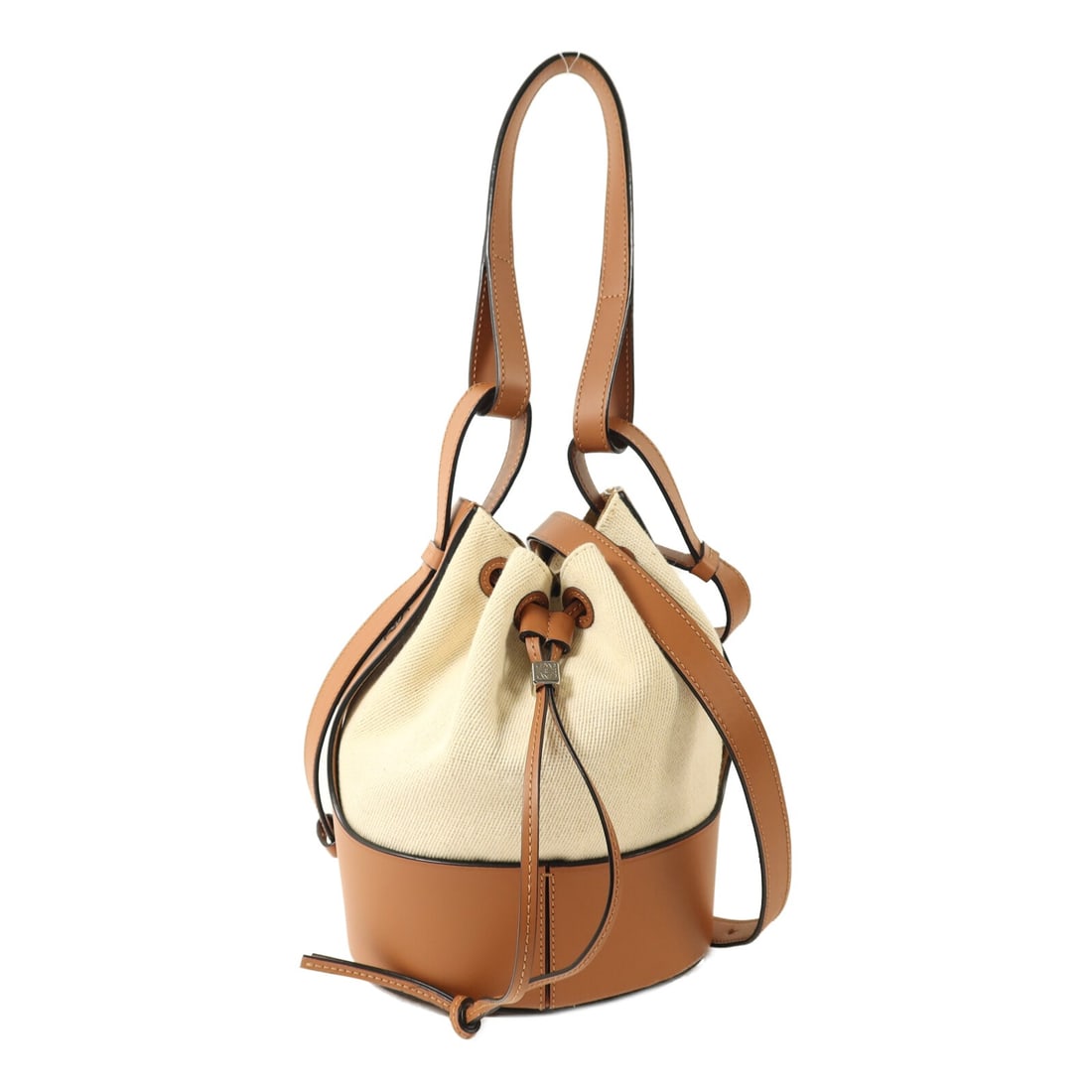 Balloon Brown and Beige Canvas Calfskin 2way Shoulder Bag by LOEWE: Balloon Brown and Beige Canvas Calfskin 2way Shoulder Bag by LOEWE This LOEWE Balloon 2-way shoulder bag features a stylish combination of brown and beige canvas with calfskin (cowhide) leather. Desig