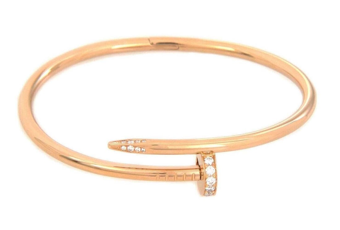 Juste un Clou Diamond Rose Gold Bangle Bracelet by Cartier with Paper Size 18: Juste un Clou Diamond Rose Gold Bangle Bracelet by Cartier with Paper Size 18 This Cartier Juste un Clou bangle bracelet is crafted from 18k pink (rose) gold and features Cartier's signature nail-insp