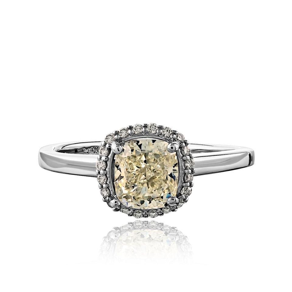 Cushion Cut 1.20ct Diamond Engagement Ring in 14K White Gold M SI2 GIA: Cushion Cut 1.20ct Diamond Engagement Ring in 14K White Gold M SI2 GIA This pre-owned ring features a cushion cut diamond weighing 1.20 carats, set in 14K white gold. The ring is a size 6 and offers a