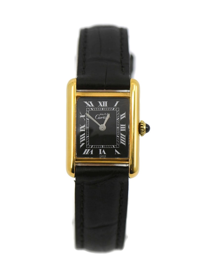 Tank Vermeil Sterling Silver Wristwatch by Cartier with Black Dial: Tank Vermeil Sterling Silver Wristwatch by Cartier with Black Dial This Cartier Tank Vermeil wristwatch features a sterling silver case with a classic rectangular design, complemented by a black analo