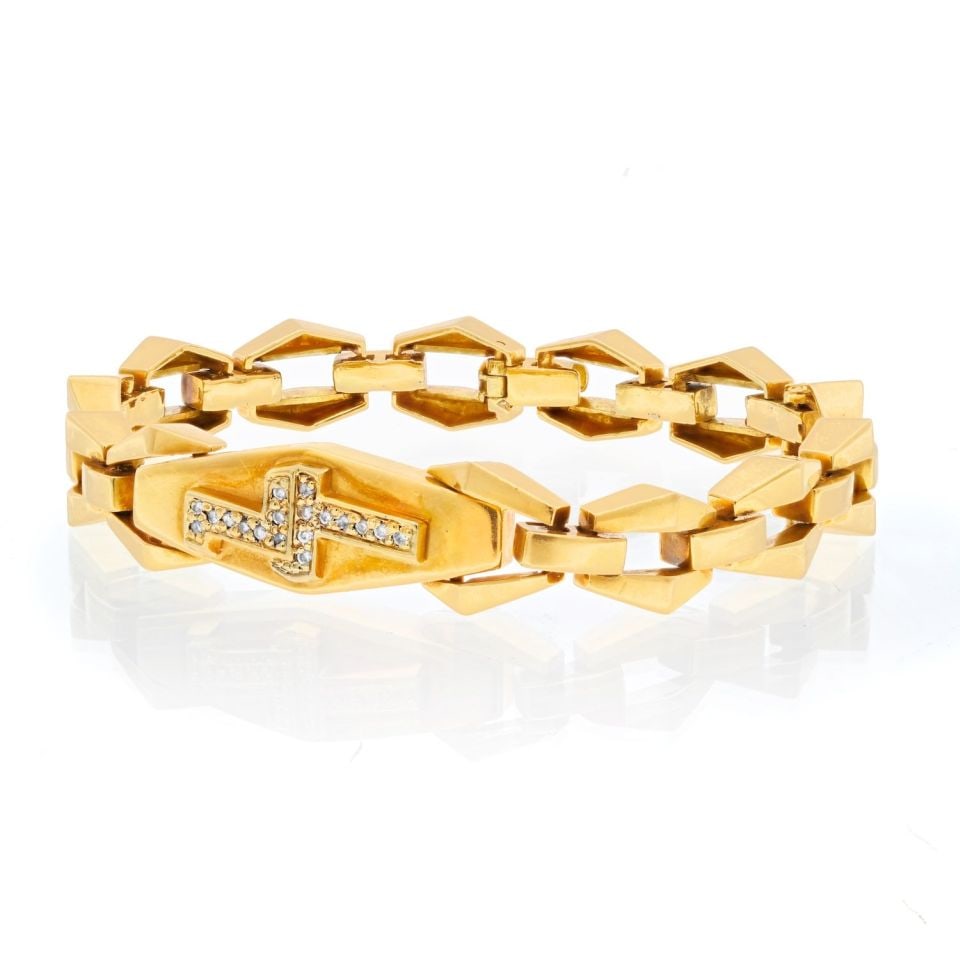David Webb 18K Yellow Gold Lightning Bolt Bracelet with Diamonds: David Webb 18K Yellow Gold Lightning Bolt Bracelet with Diamonds This exquisite David Webb bracelet features a striking design crafted from 18K yellow gold, weighing 46.3 grams. The piece showcases a