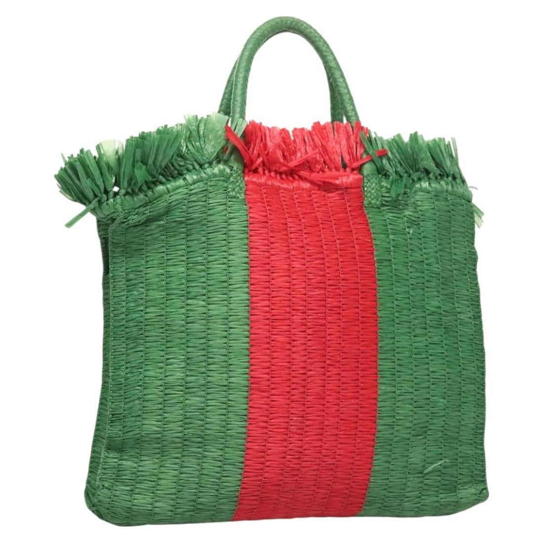 Gucci Cestino Green Wicker Tote Bag from Italy: Gucci Cestino Green Wicker Tote Bag from Italy This Gucci Cestino Tote is crafted from woven wicker in a green hue and designed for women. Made in Italy, it features a spacious interior. The bag shows