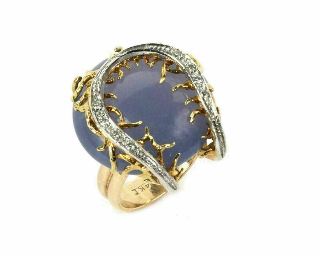 Size 5.5 Horseshoe Ring in 14k Two Tone Gold with Diamond and Chalcedony: Size 5.5 Horseshoe Ring in 14k Two Tone Gold with Diamond and Chalcedony This vintage ring features a striking horseshoe design set in 14k two-tone gold. Adorned with a 21.4mm round chalcedony gemston