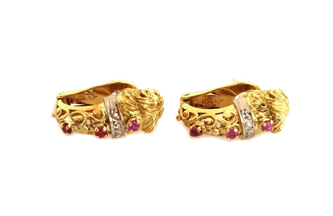 Vintage 18k Gold Lion Earrings with Rubies and Diamonds: Vintage 18k Gold Lion Earrings with Rubies and Diamonds Discover the elegance of these vintage huggie earrings, expertly crafted from 18k yellow and white gold. Each earring features a beautifully det