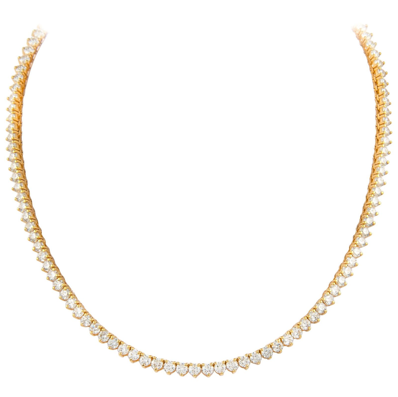 16.25ct Diamond Tennis Necklace 18k Yellow Gold: 16.25ct Diamond Tennis Necklace 18k Yellow Gold This stunning diamond tennis necklace features a classic three-prong setting crafted from 18k yellow gold. It showcases 16.25 carats of round brilliant