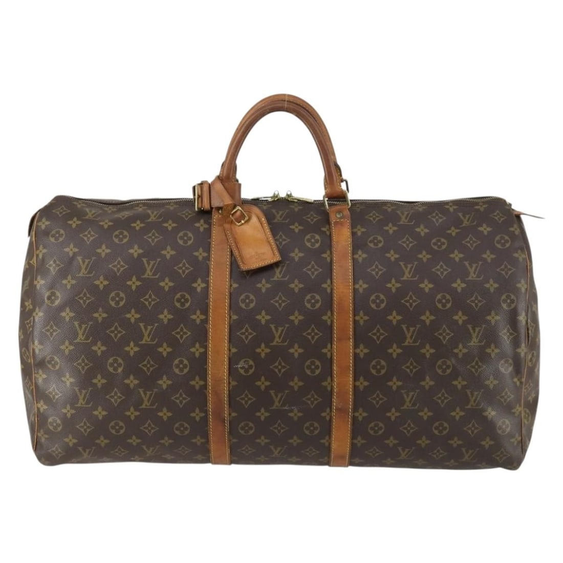 Monogram Canvas Keepall Travel Bag by Louis Vuitton 60cm: Monogram Canvas Keepall Travel Bag by Louis Vuitton 60cm This Louis Vuitton Keepall bag showcases the iconic Monogram canvas in brown, designed for unisex use. The bag was crafted in France and featur