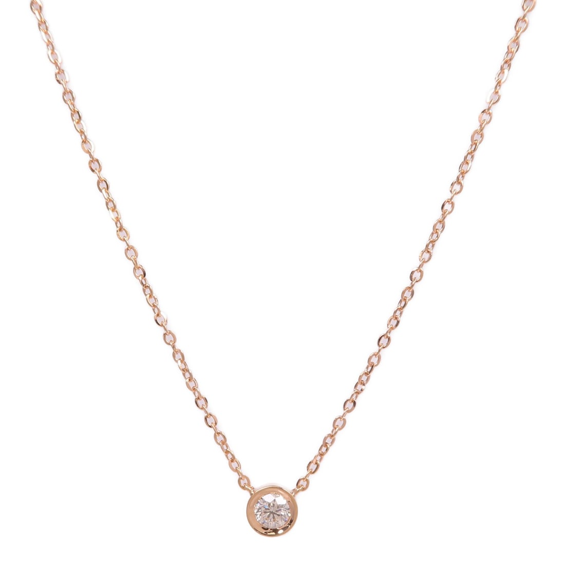 Diamond Pendant Necklace in 18K Rose Gold by JEWELRY: Diamond Pendant Necklace in 18K Rose Gold by JEWELRY This elegant necklace features a diamond set in 18K pink (rose) gold, offering a sophisticated and timeless design. The piece is in very good condi