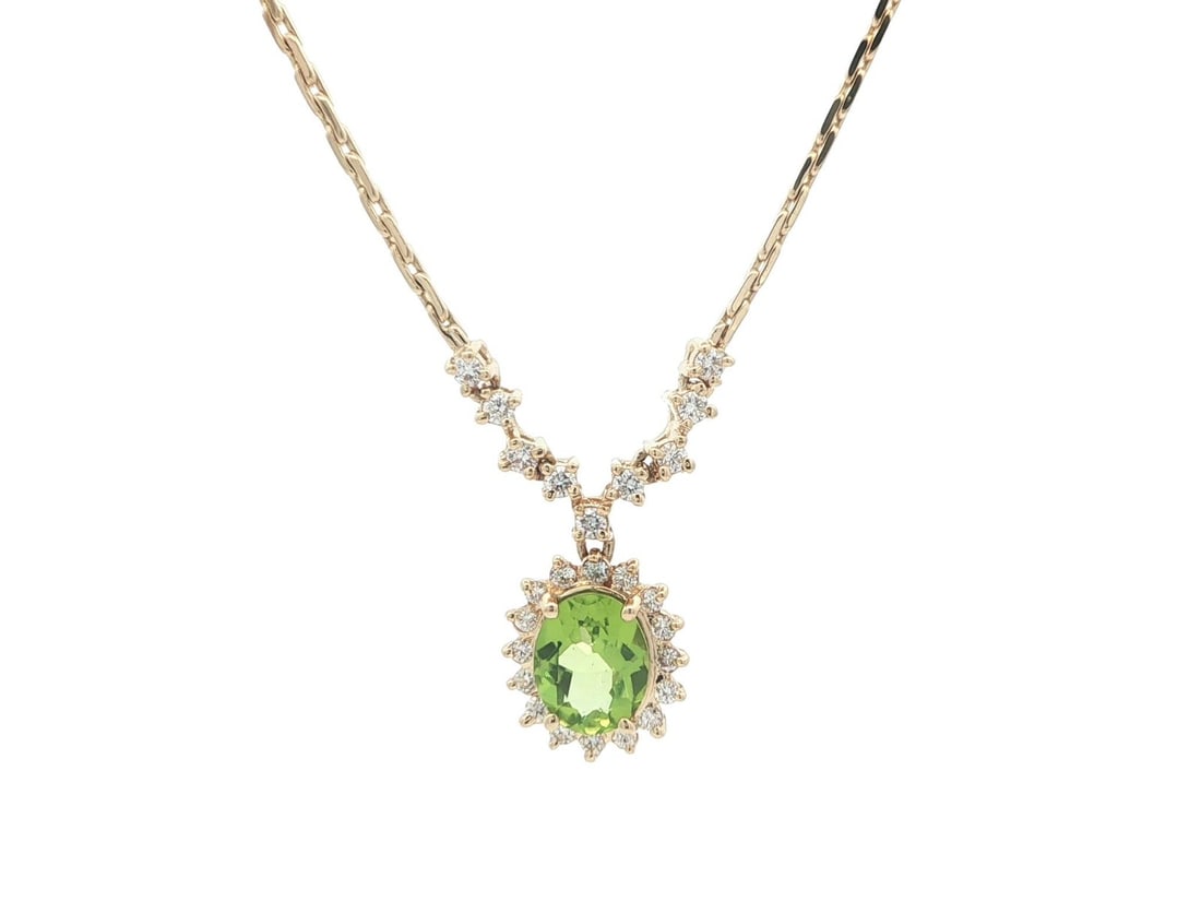 Oval Peridot and Diamond Pendant on Yellow Gold Fancy Cable Necklace 16.5in: Oval Peridot and Diamond Pendant on Yellow Gold Fancy Cable Necklace 16.5in This necklace features a solid 13-14k yellow gold fancy cable link chain with a barrel clasp and safety latch. The pendant s