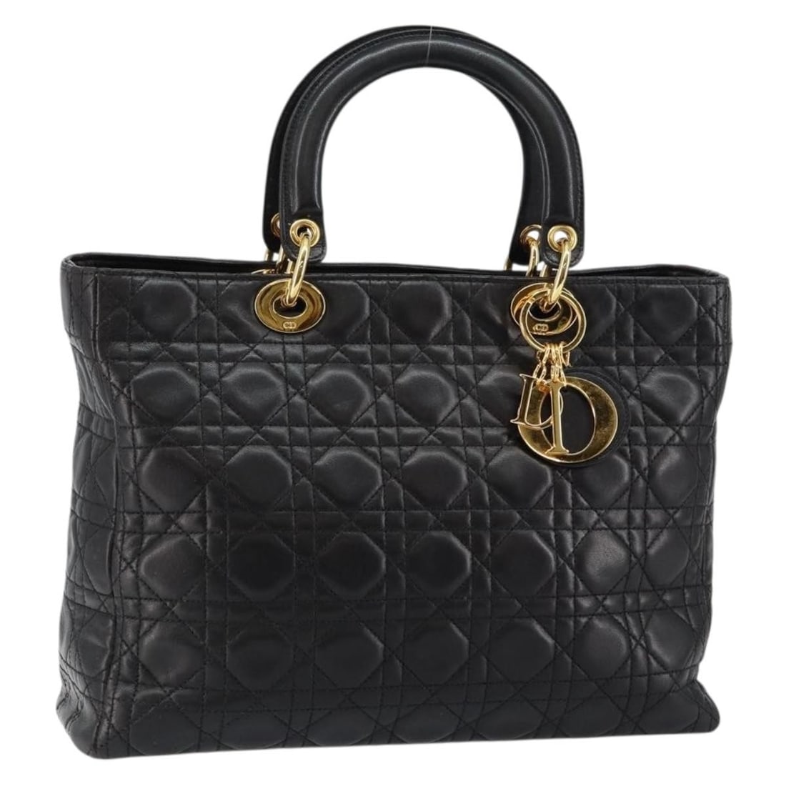 Lady Dior Vintage Cannage Quilted Black Lambskin Handbag by Christian Dior: Lady Dior Vintage Cannage Quilted Black Lambskin Handbag by Christian Dior This pre-owned Christian Dior Vintage Lady Dior Bag features the iconic Cannage quilted lambskin leather in black. Designed f