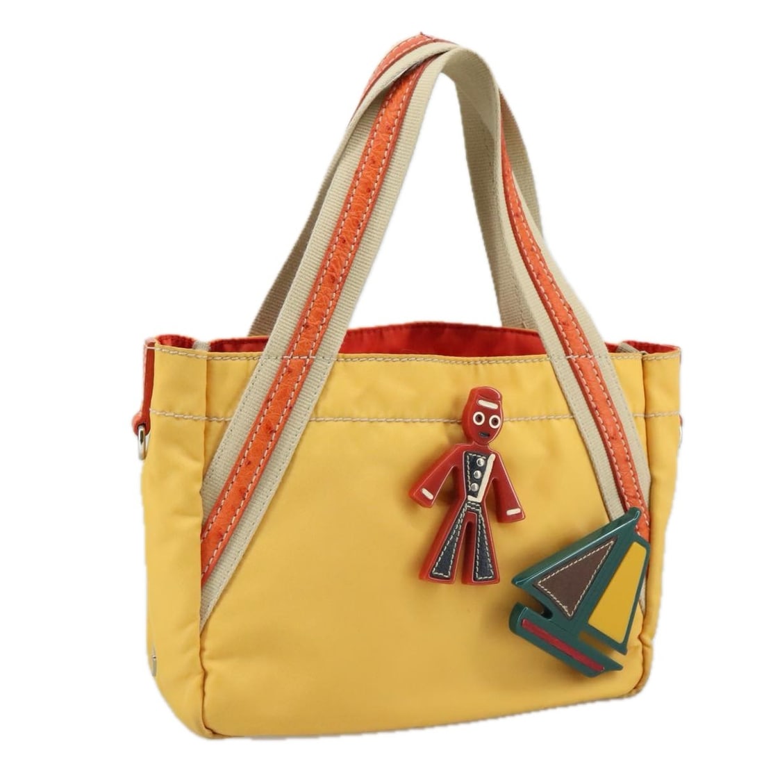 Prada Tessuto Yellow Nylon Vintage Handbag 22cm x 17cm x 8cm: Prada Tessuto Yellow Nylon Vintage Handbag 22cm x 17cm x 8cm This Prada vintage handbag is crafted from yellow nylon and designed for women. Made in Italy, it features a classic silhouette with practi
