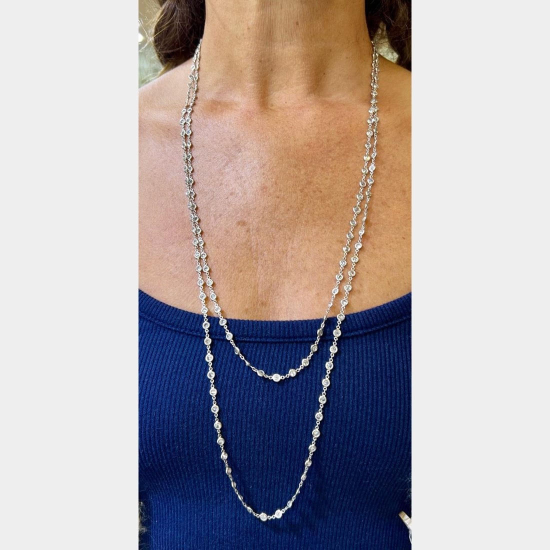 Platinum 25.10 Ct Diamond by the Yard Necklace 57 Inches: Platinum 25.10 Ct Diamond by the Yard Necklace 57 Inches This stunning Platinum Diamond by the Yard Necklace features an impressive total diamond weight of approximately 25.10 carats. It is meticulous