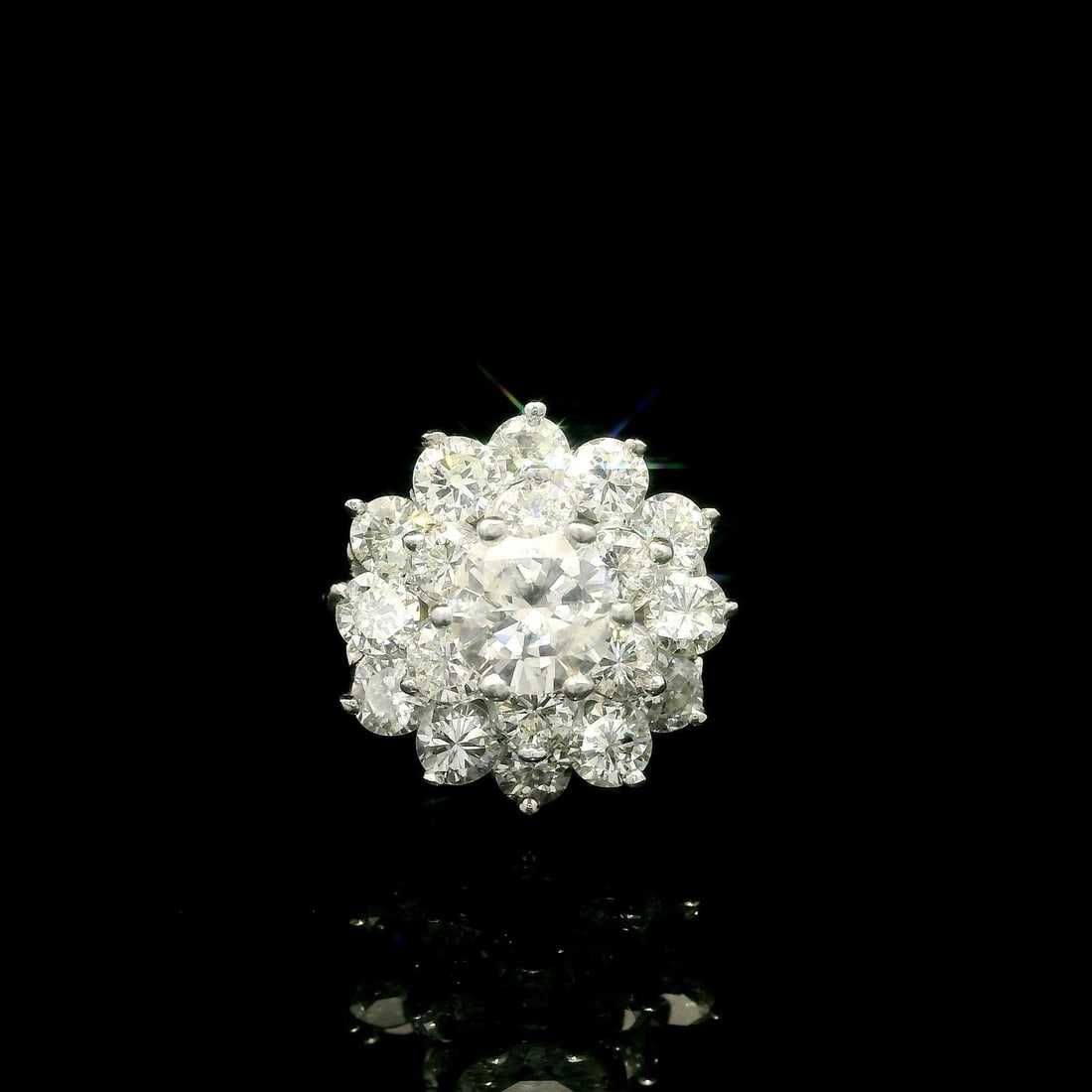 14k White Gold 3.21ctw Diamond Cocktail Ring Cluster Design: 14k White Gold 3.21ctw Diamond Cocktail Ring Cluster Design This exquisite cocktail ring features a stunning tiered cluster design crafted from solid 14k white gold. The centerpiece showcases a natura